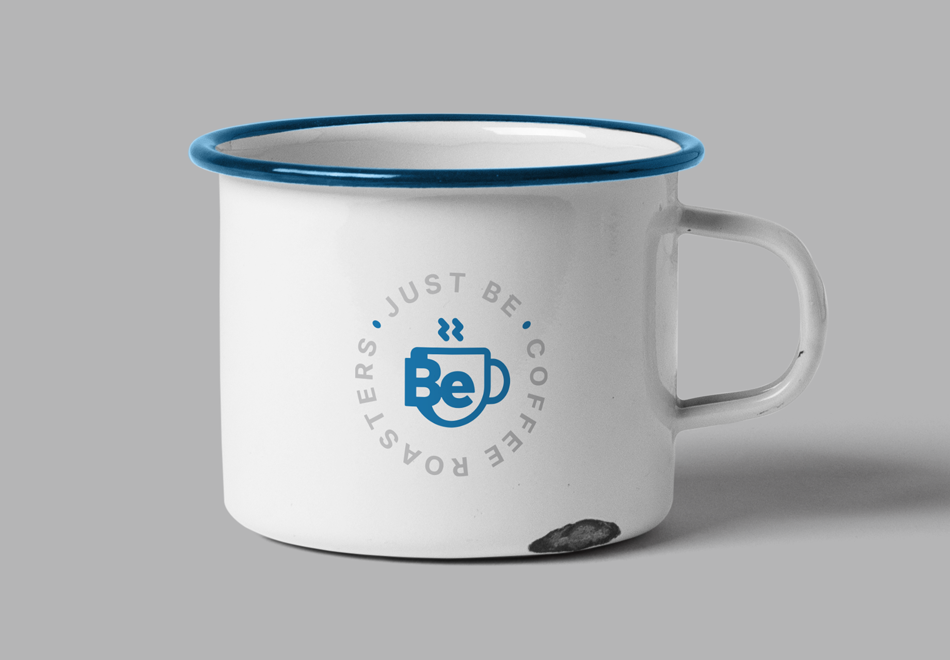 Coffe cup with a Just Be logo on it