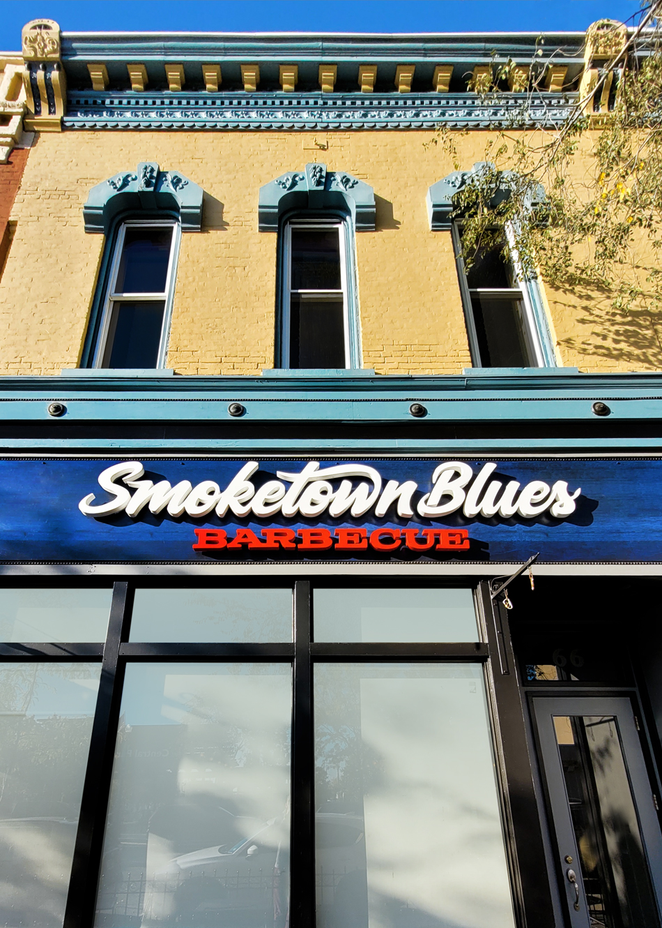Smoketown Blues BBQ building sign logo looking up