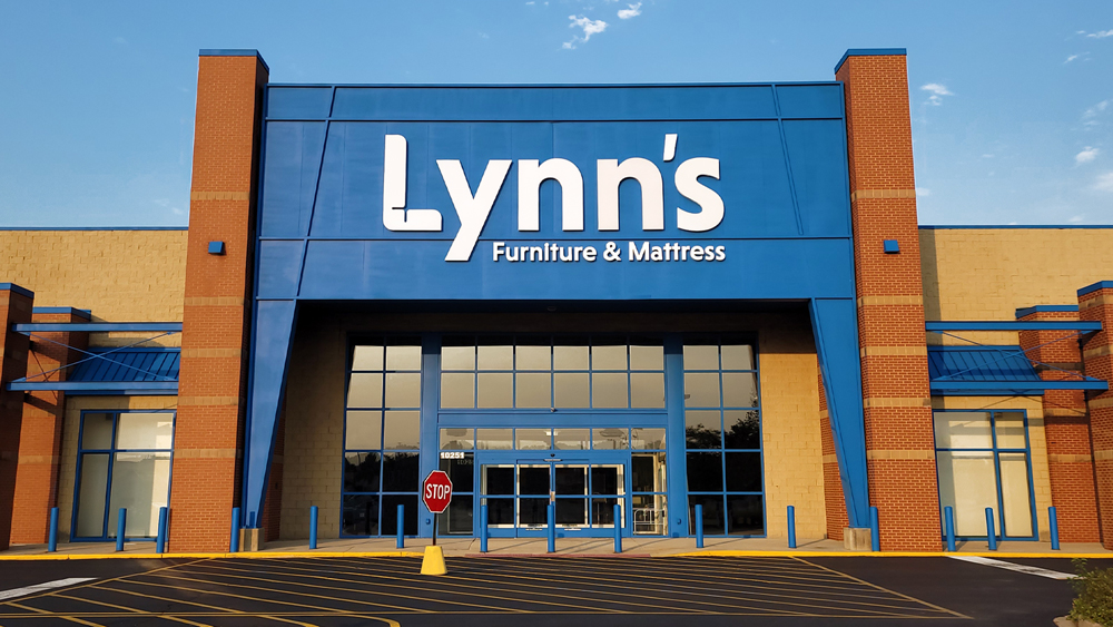 Lynns Furniture and Mattress logo design on building facade